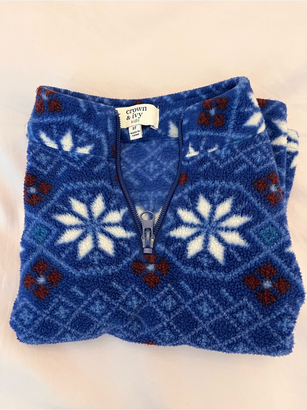 crown & ivy blue fleece pullover with white snowflake pattern